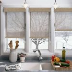 Kitchen window with roller blinds