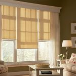 Beige-colored blinds on the living room window