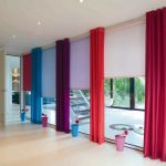 Multi-colored curtains on the panoramic window
