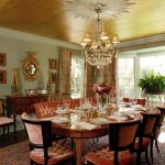 Cornices in dining room from light wood with gilding