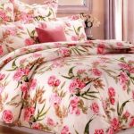 Beautiful fabric with roses is ideal for sewing bed