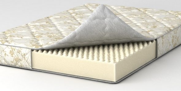 Monolithic block of polyurethane foam