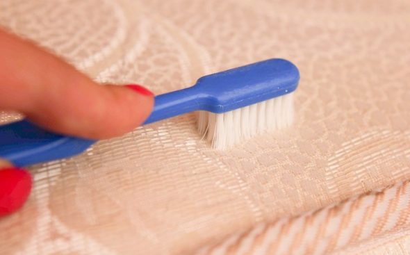 Wipe the stain with a brush