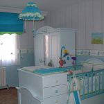 Turquoise color in the interior of the nursery for a little boy