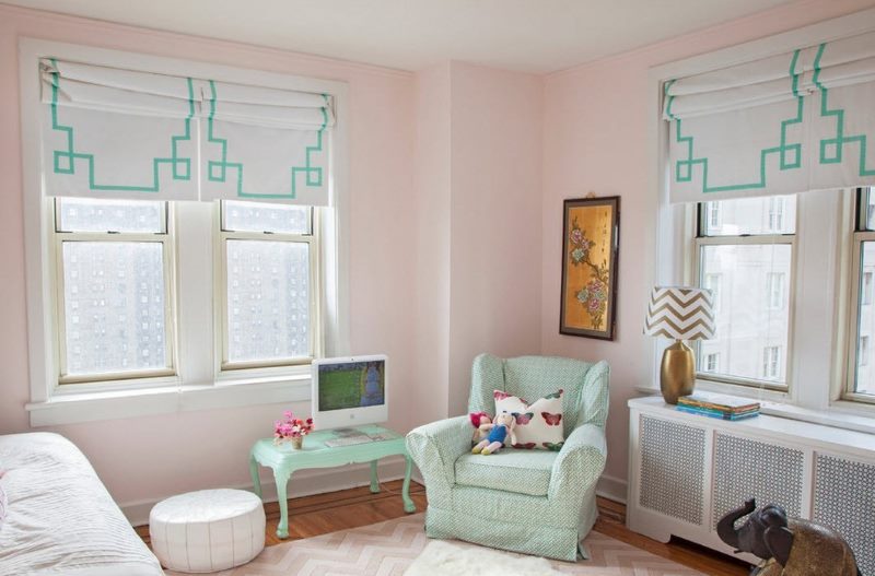 Children's room windows with light-colored roman blinds
