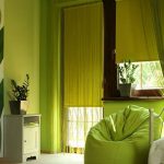 Shades of green in the interior of the bedroom