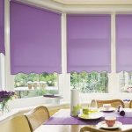 Purple curtains on the windows in the dining area