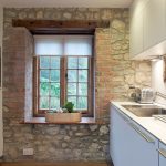 Stone wall in the interior of the kitchen