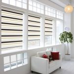White room with striped curtains