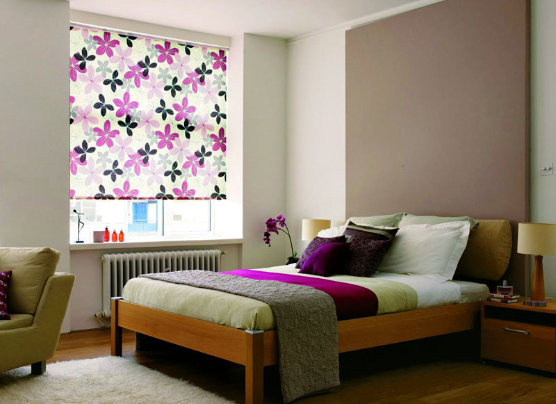 Interior bedroom with roller blinds in the window opening