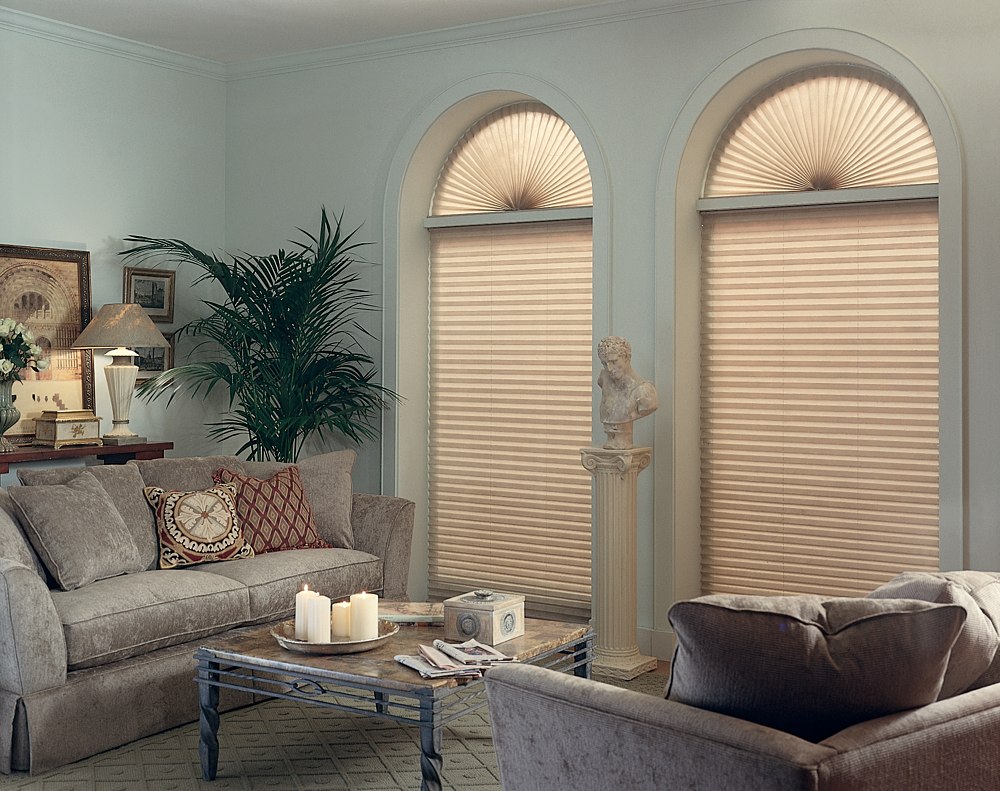 Window decoration with an arch using pleated curtains