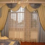 White curtains and yellow-blue curtains look good in a set.