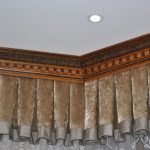 Wooden eaves for stretch ceiling