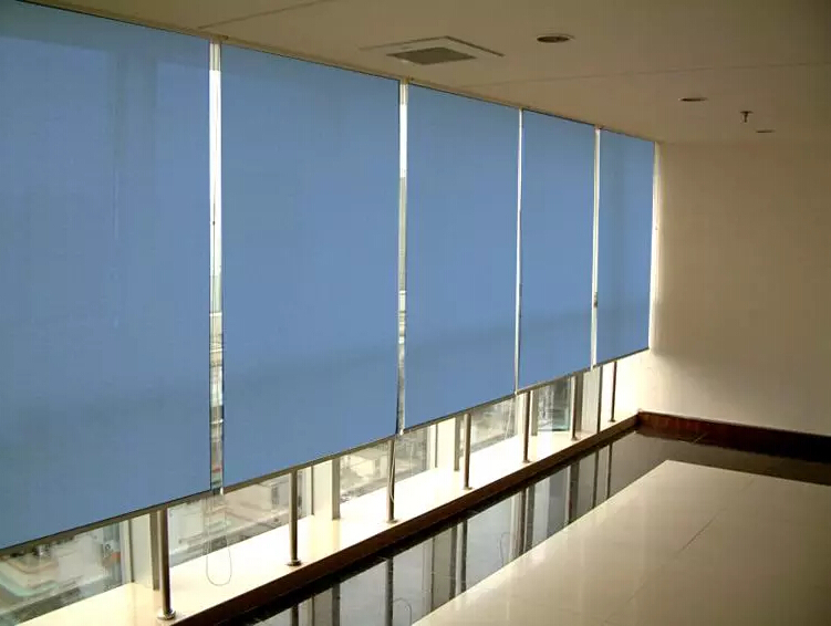 Blue roller blinds on the panoramic window