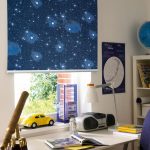 Star galaxy on the curtains in the nursery