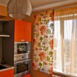 Bright juicy curtains and curtains in the kitchen