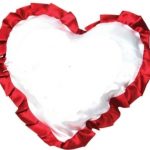 White heart cushion with red border