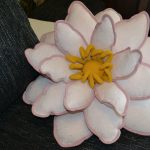 White and pink flower pillow