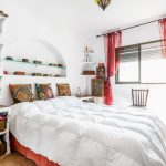 Red tulle in white bedroom