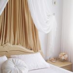 Canopy over the headboard in the female bedroom