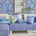 Blue sofa cushions of different sizes and shapes and from different materials