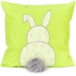 Beautiful pillow with bunny on the pillow with your hands