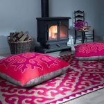 Beautiful patterned cushion for the fireplace