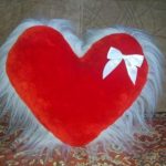 Red heart with fur and white bow