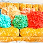 Beautiful knitted pillows on the sofa