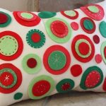 Pillow case on a rectangular pillow with felt decoration