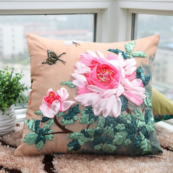Pillow embroidered with ribbons