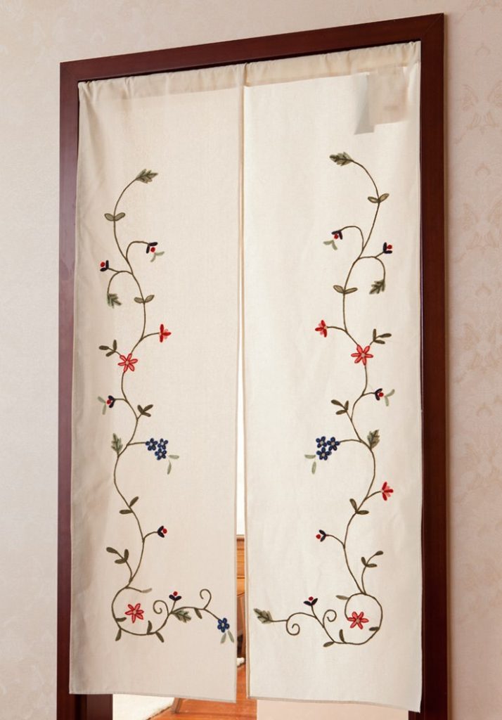 Straight curtains with a pattern in the doorway
