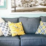 Multicolored pillow on sofa cushions