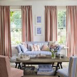 Pink and blue - a contrasting combination of furniture and textiles in the living room