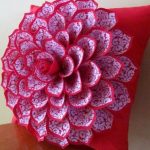 Elegant pillow with a flower with double petals