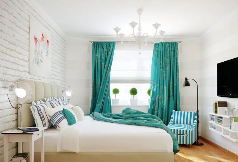 White brick wall in the bedroom with turquoise curtains