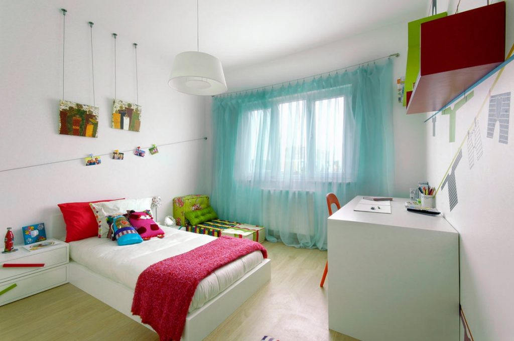 Children's bedroom with turquoise curtains
