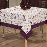 Tablecloth with purple edging for a square table
