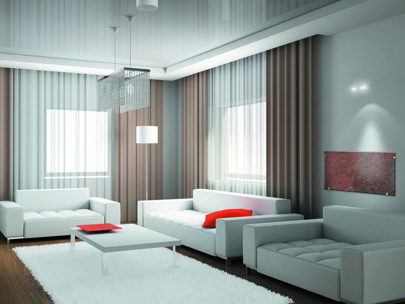 Kolme sohvaa minimalistisen tyylin olohuoneessa