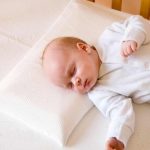 Narrow orthopedic pillow for a child