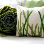 Zielona gęsta poduszka z tkaniny