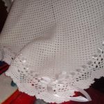 Openwork white knitted plaid