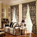 Beige and black curtains in tone of furniture for windows with a wall