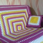 Large square plaid on the sofa with decorative pillows do it yourself