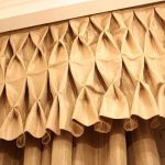 Beautiful design of the top of the curtains in the form of puffs