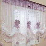 Lilac decor on white hangings