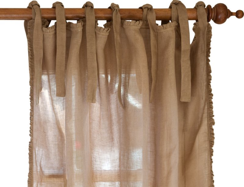 Print curtain on wooden cornice