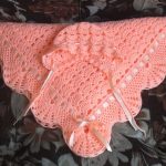 Delicate peach blanket with cap included