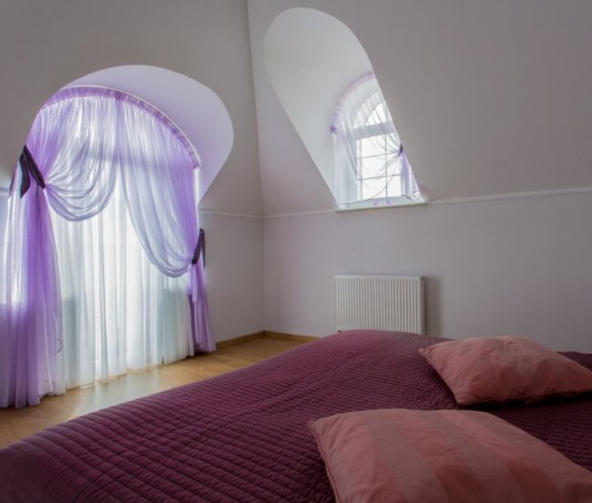 Light organza curtains on the bedroom window