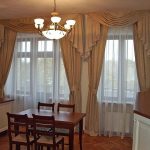 Curtains for the kitchen-dining room with two windows and a balcony